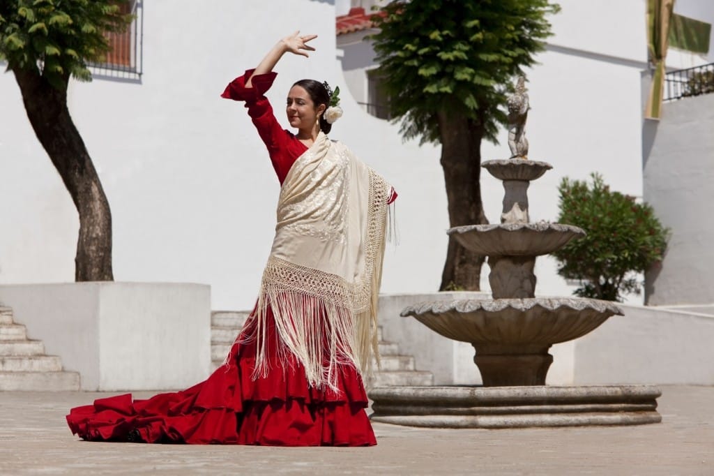 Traditional Woman Spanish Flamenco Dancer In Red Dress