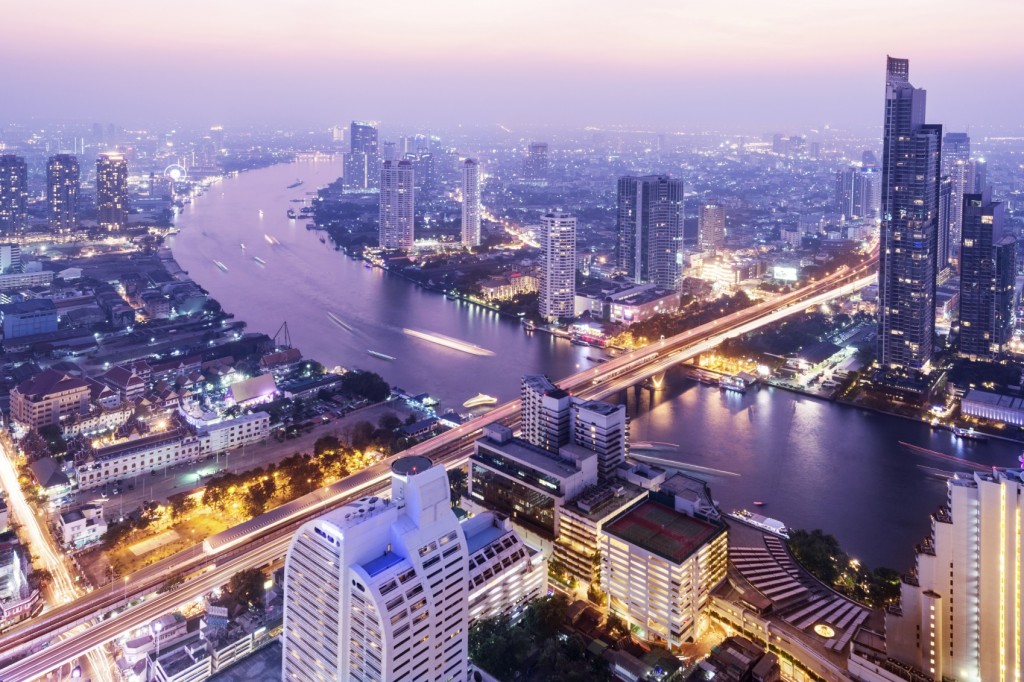 Aerial view of the Bangkok city skyline and the Chao Phraya River, Thailand.