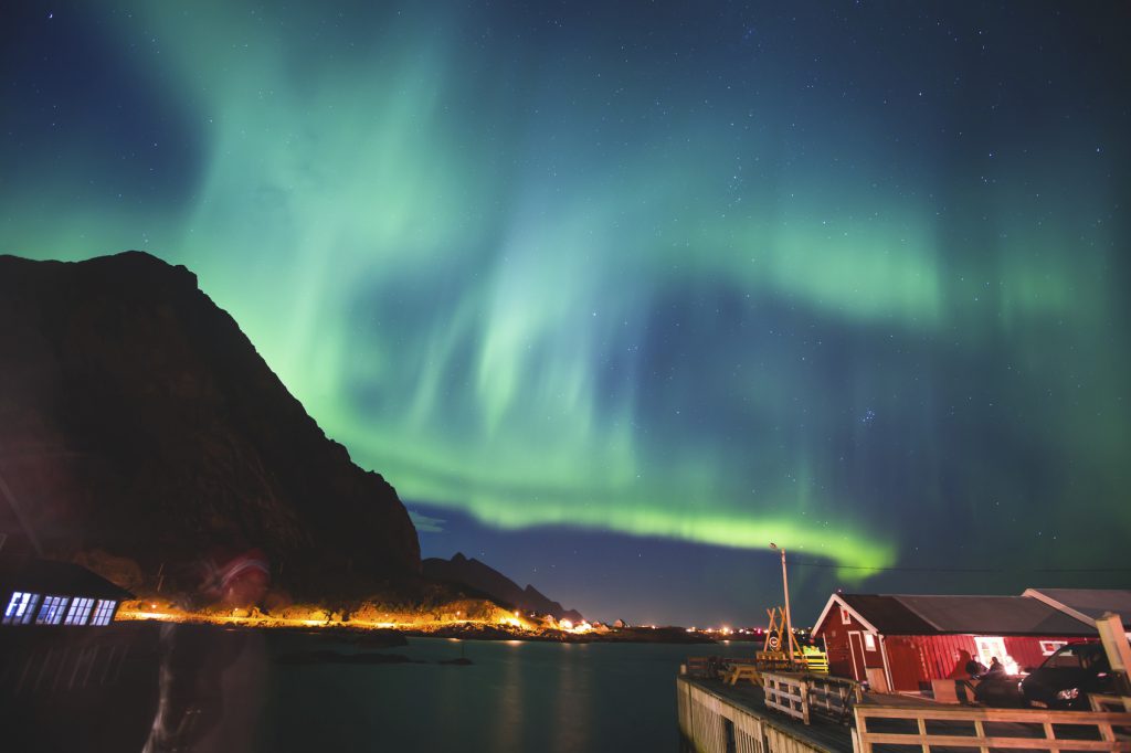 Beautiful picture of massive multicoloured vibrant Aurora Borealis, Aurora Polaris, Polar Light, also know as Northern Lights in the night sky over Norway, Lofoten Islands